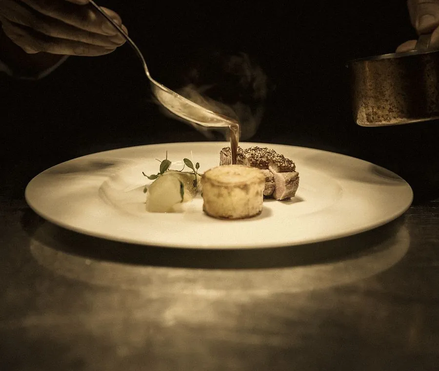 Custom nutrition plan: a chef plating a balanced dish