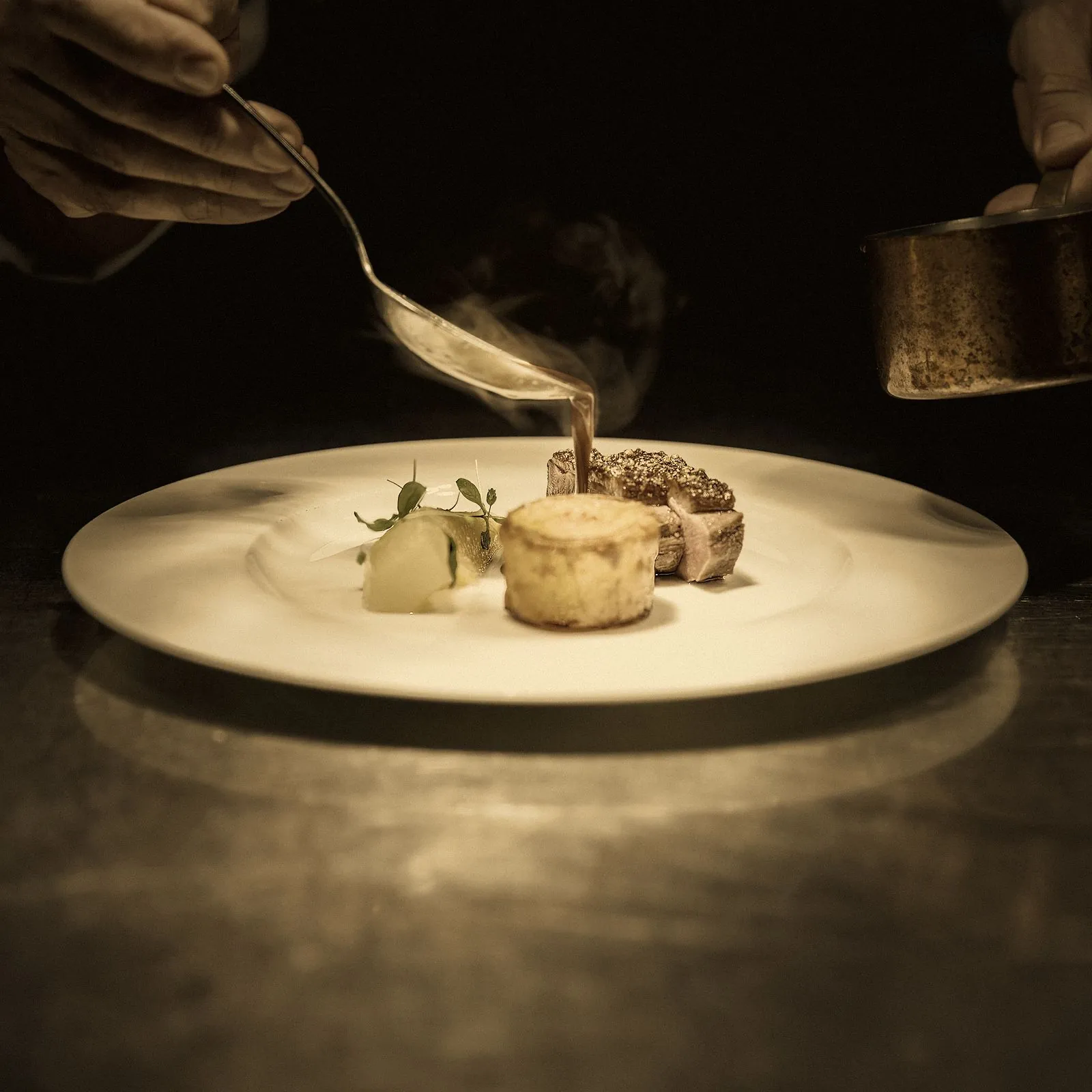 Custom nutrition plan: a chef plating a balanced dish with vegetables
